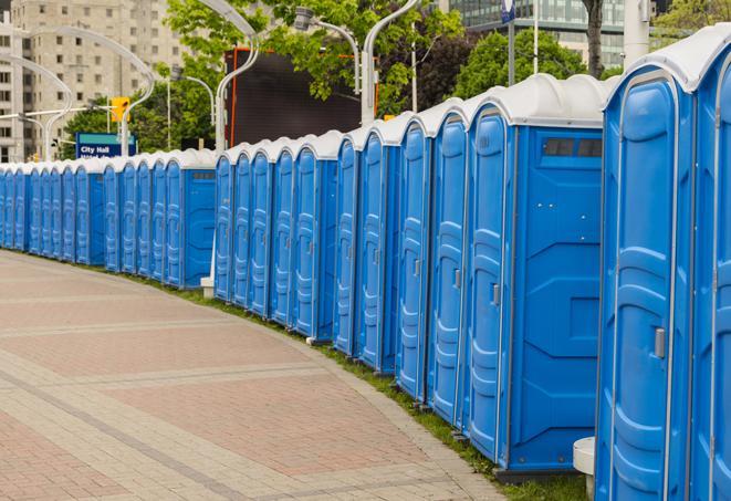 a row of sleek and modern portable restrooms at a special outdoor event in Angelus Oaks